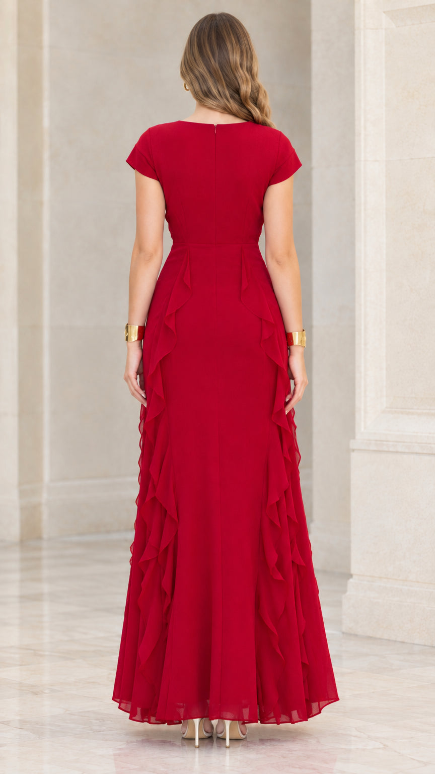 Back view of model wearing a red floor-length gown with hidden back zipper