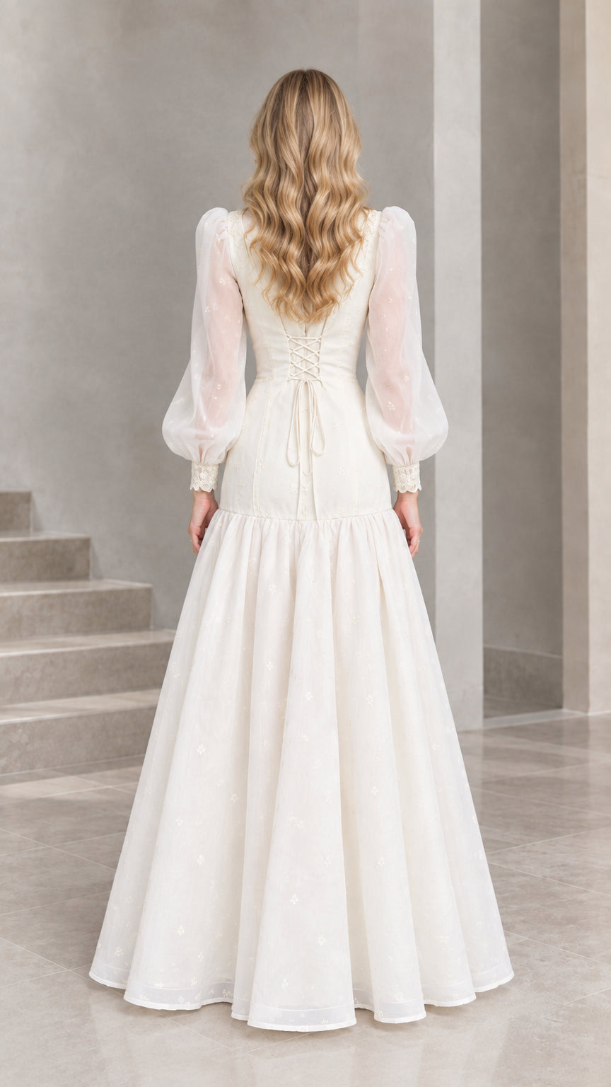 Back view of Ivory lace maxi dress showing adjustable corset lace-up back