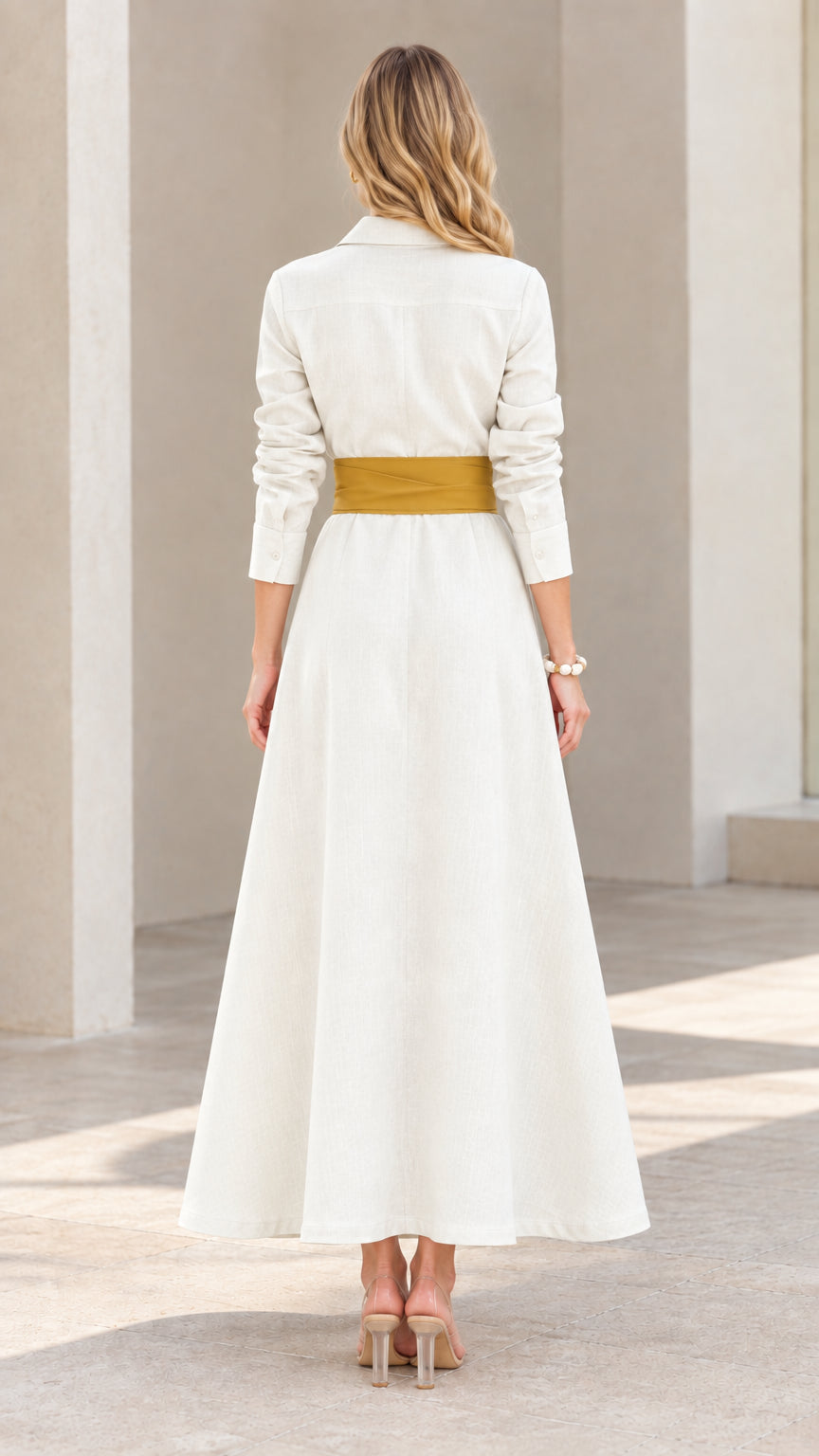Back view of model in elegant long cream maxi dress with tie belt