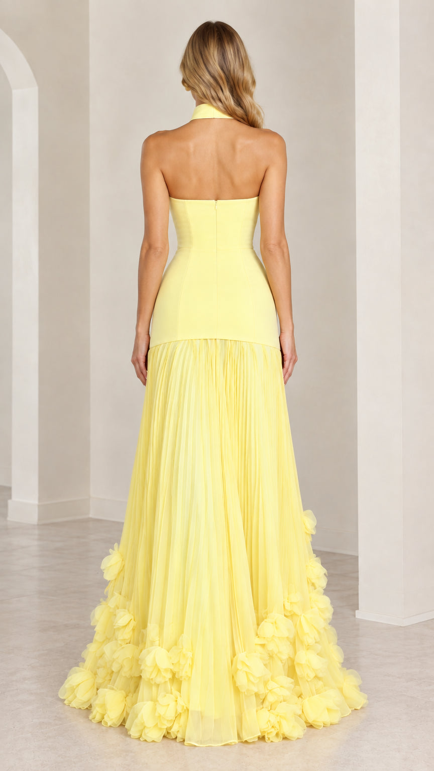 Back view of the yellow formal dress showing fitted bodice and back zip