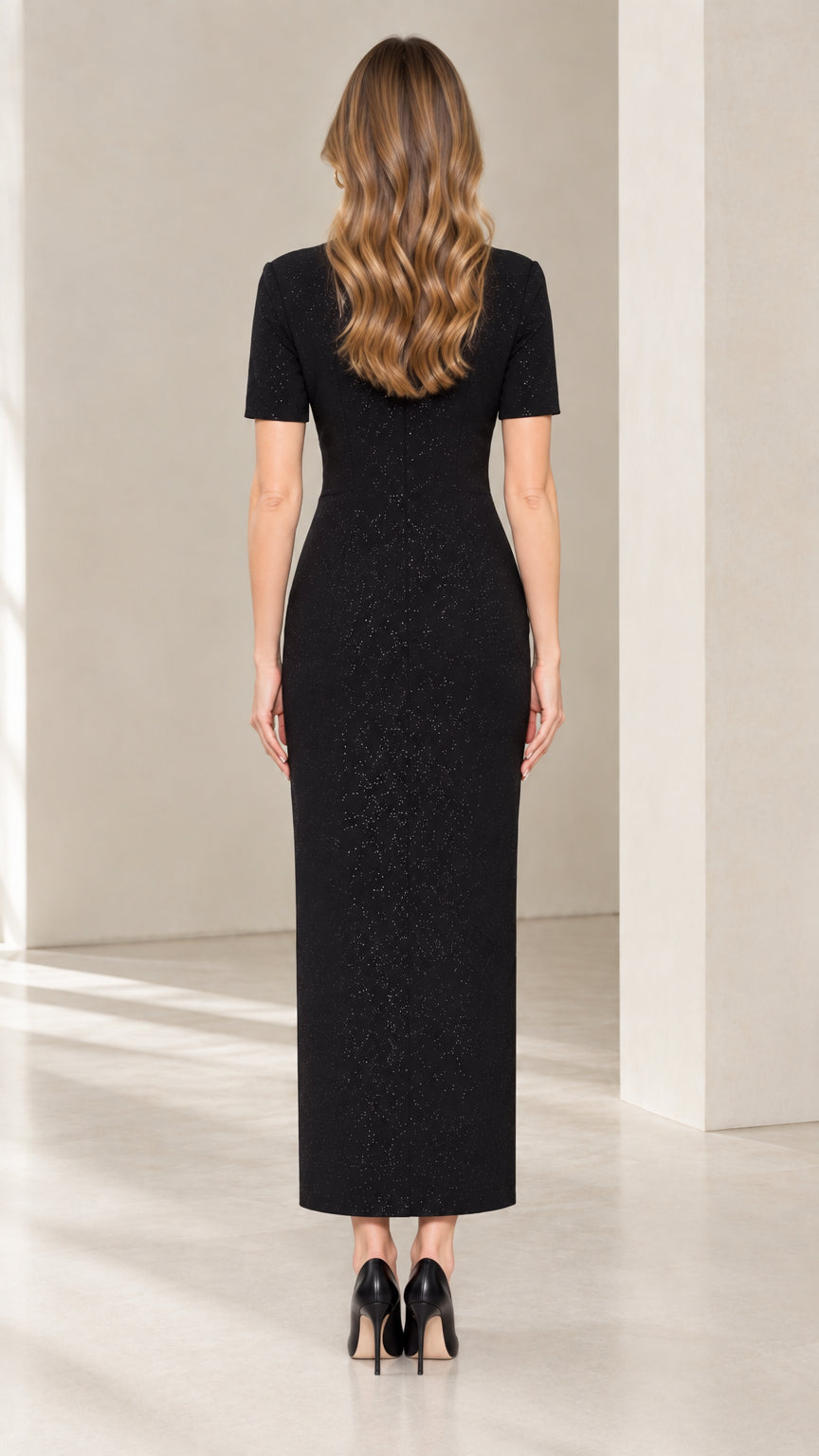 Back view of tailored black shimmer maxi dress