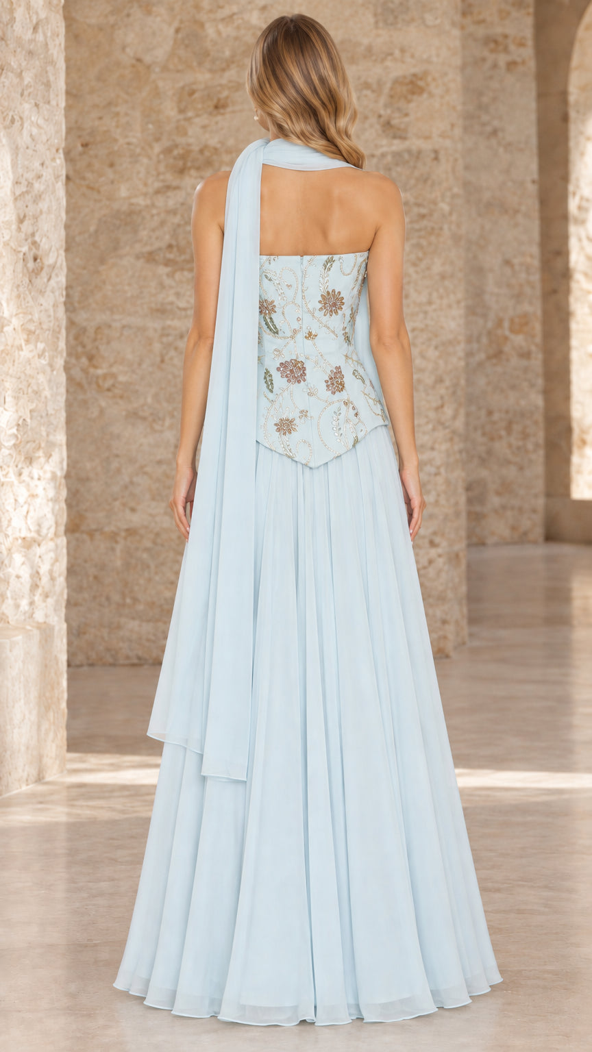 Back view of sky blue strapless evening dress with draped neck scarf detail