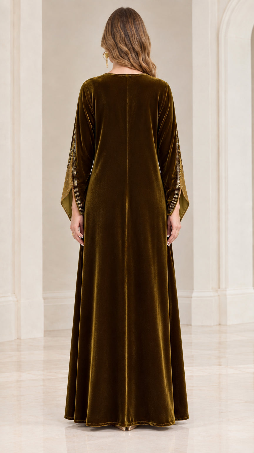 Back view of woman wearing full length olive green velvet kaftan dress