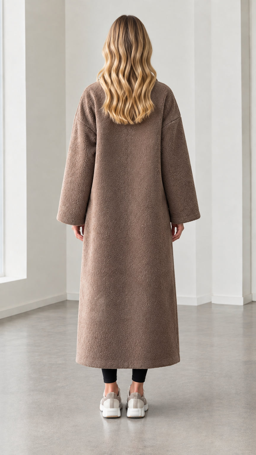 Back view of model wearing mocha textured longline open front duster coat