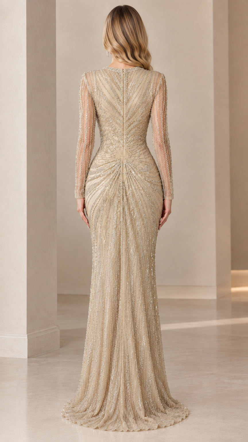 Back view of champagne long sleeve sequin gown showing back zipper and train