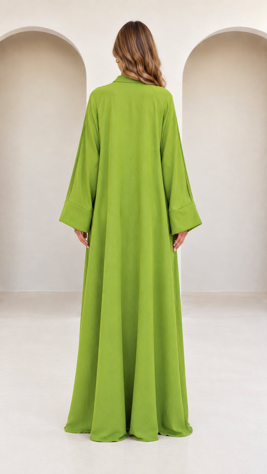 Back view of model wearing olive green flowing maxi abaya dress