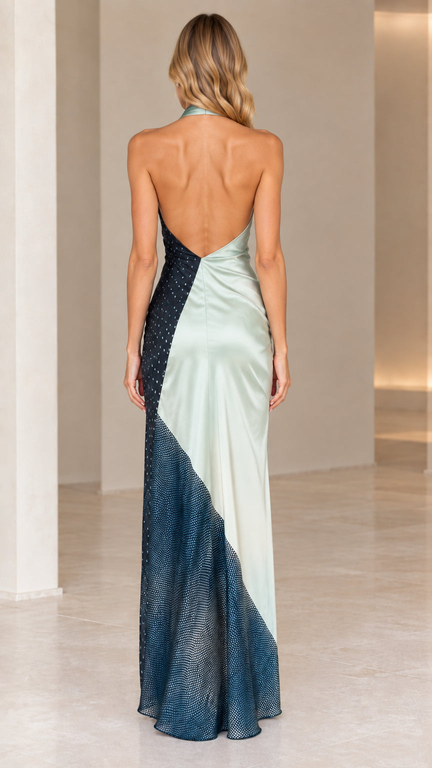 Back view of model wearing Sage Navy backless halter maxi dress