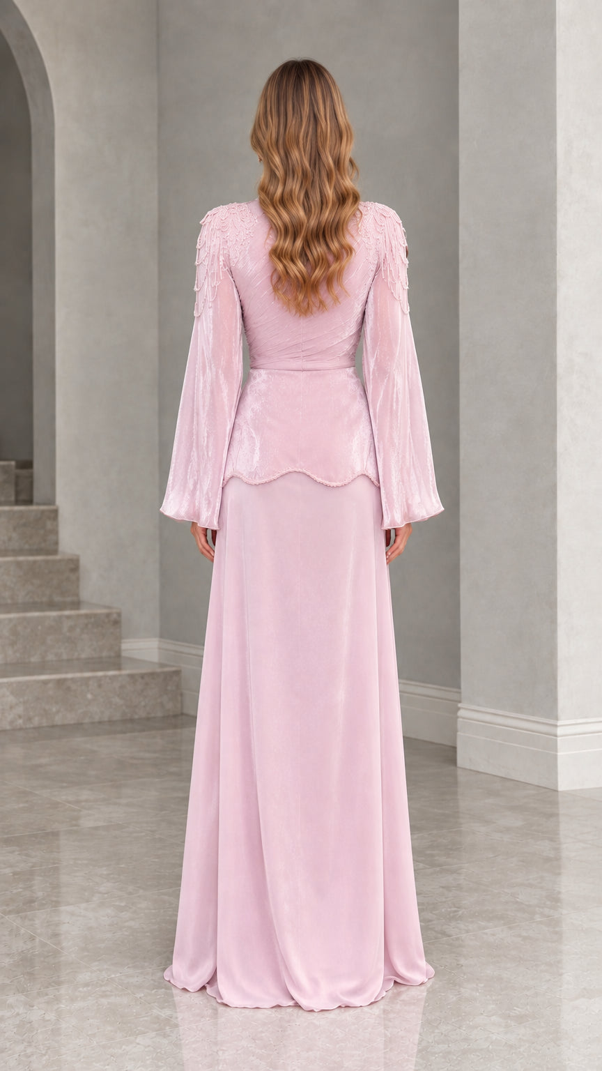 Back view of dusty pink long sleeve peplum maxi gown
