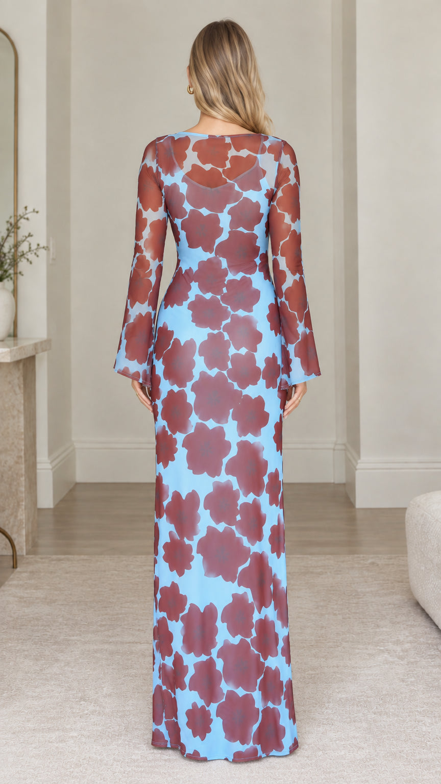 Back view of model in Blue Brown floral print maxi dress with flared sleeves