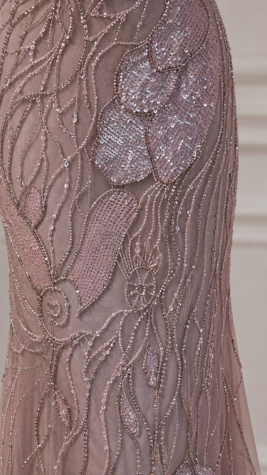 Close-up of intricate sequin and bead embroidery on gown