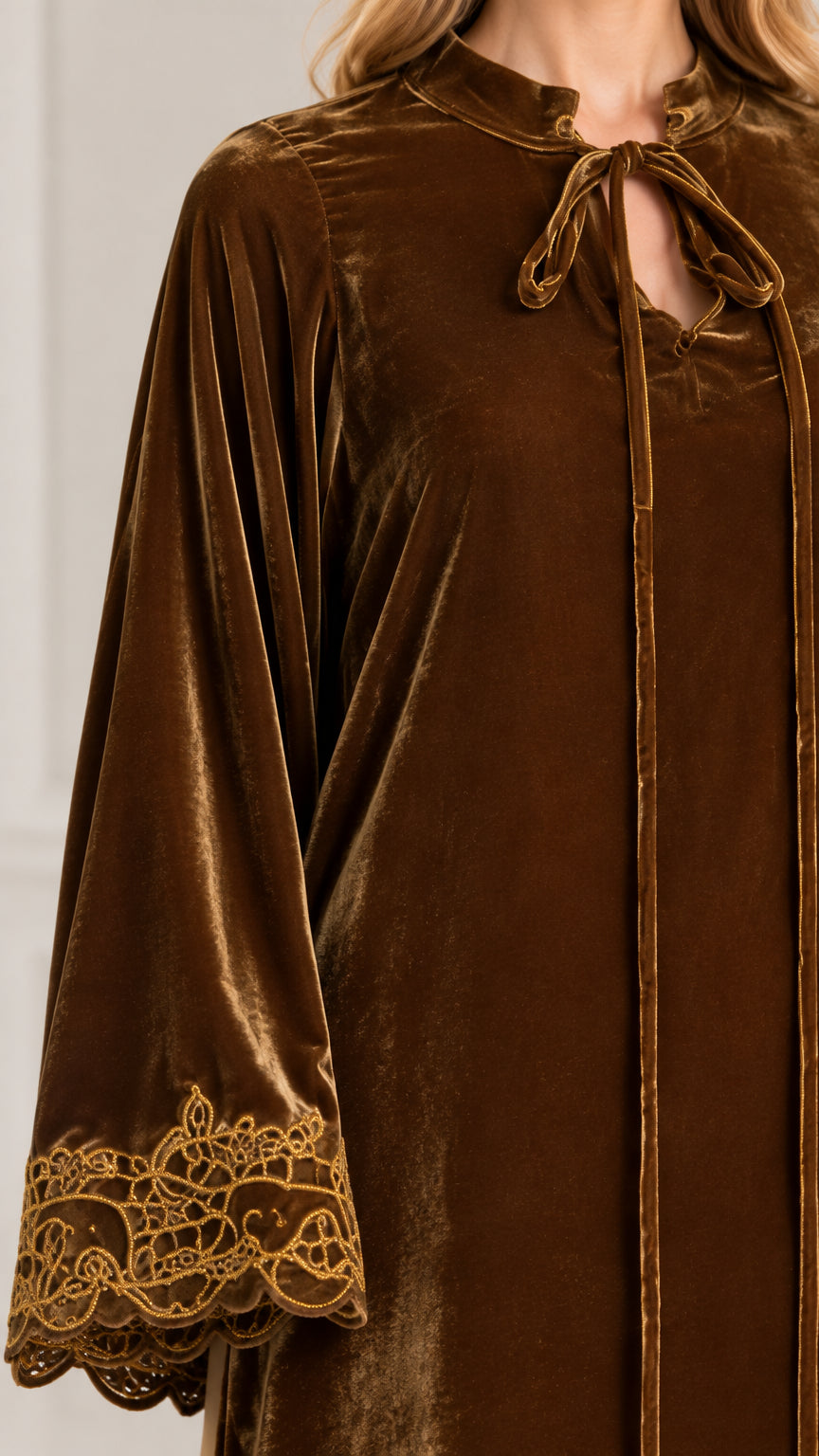 Close-up of Bronze Brown velvet neckline with self-tie and embroidered sleeve