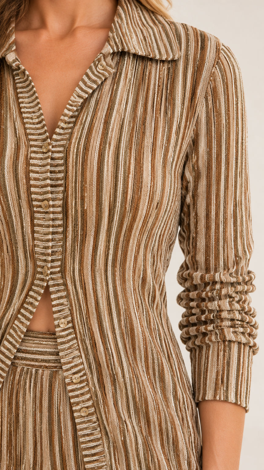 Close-up detail of collar, button placket, and ribbed knit texture on Camel striped shirt