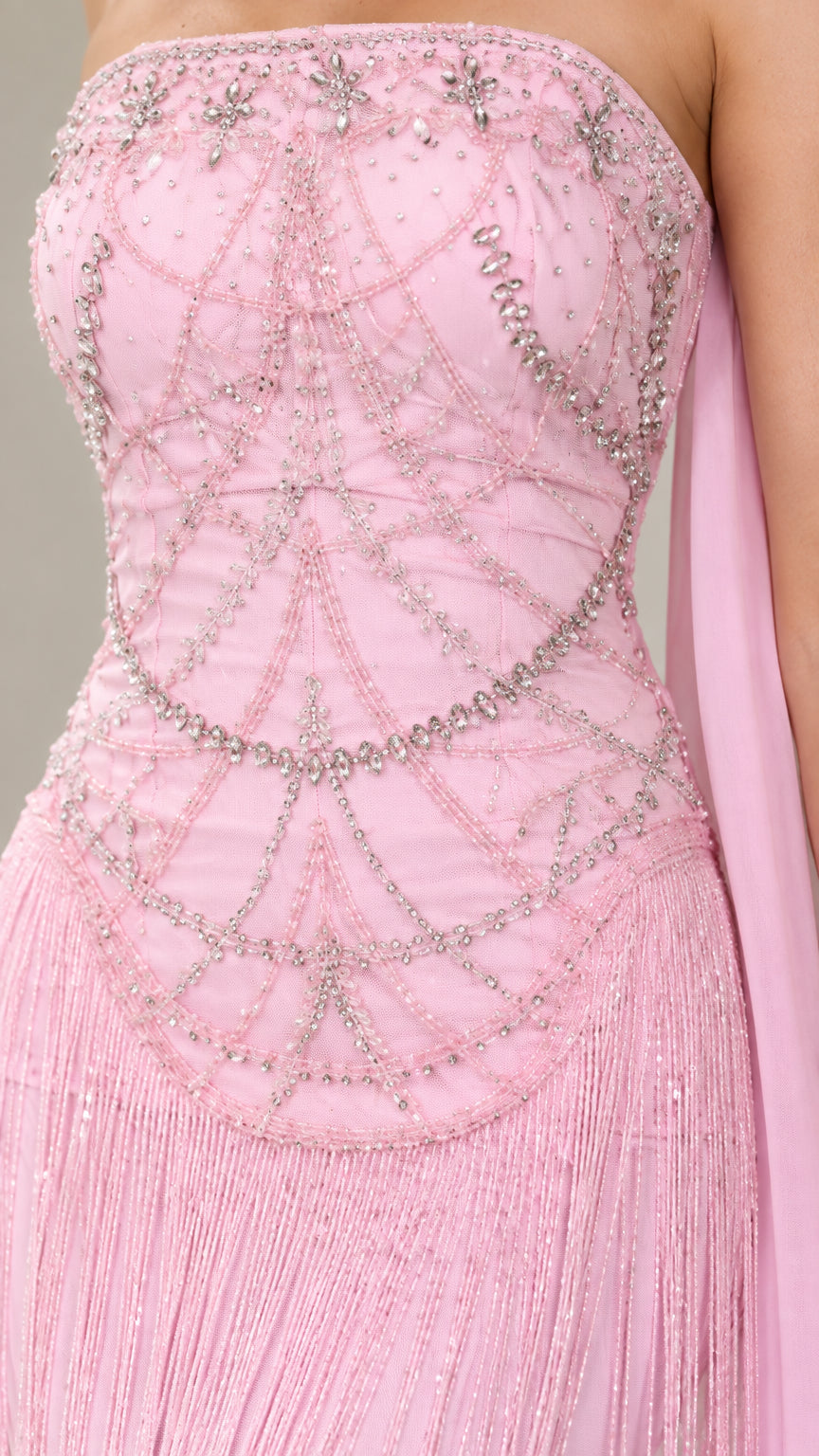 Close-up detail of Blush Pink bodice showing intricate geometric beadwork and fringe