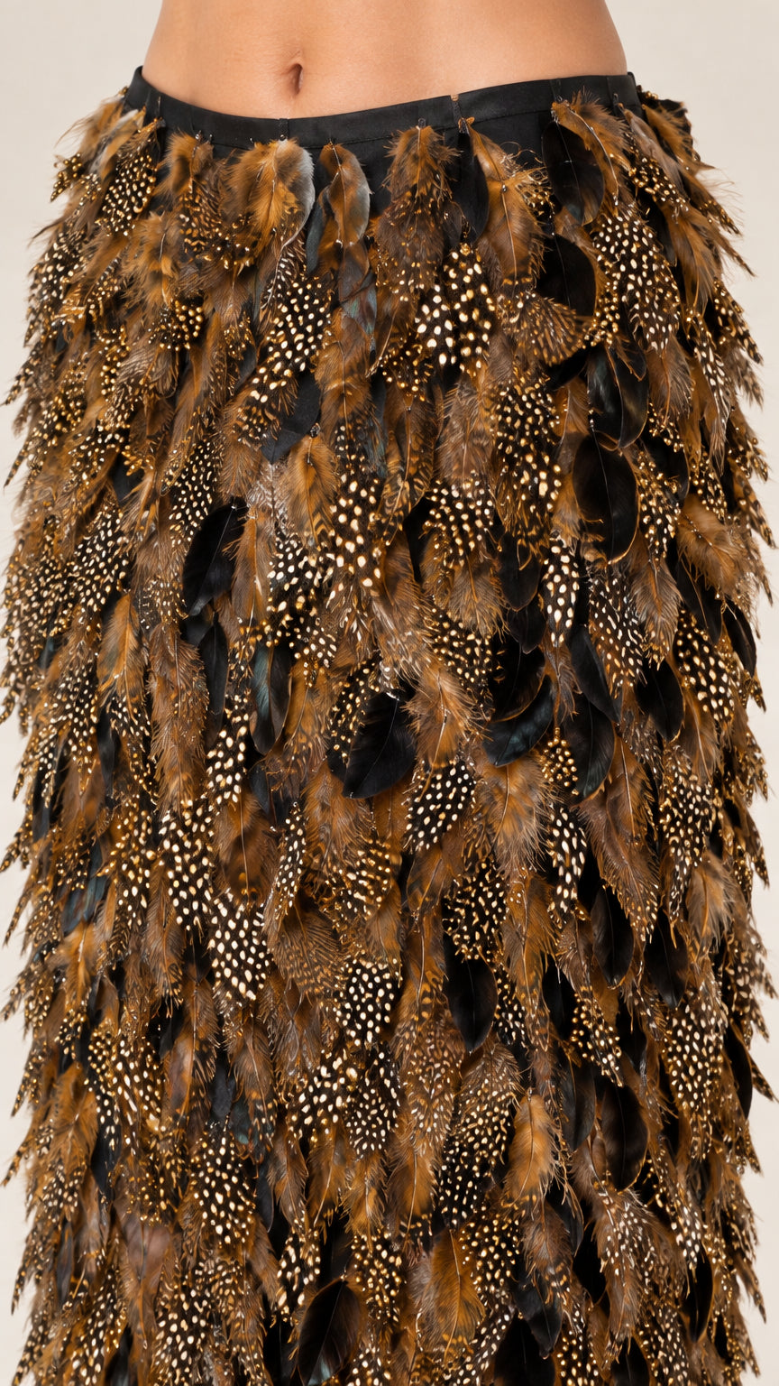 Close-up detail of spotted Bronze Brown feather texture and smooth waistband