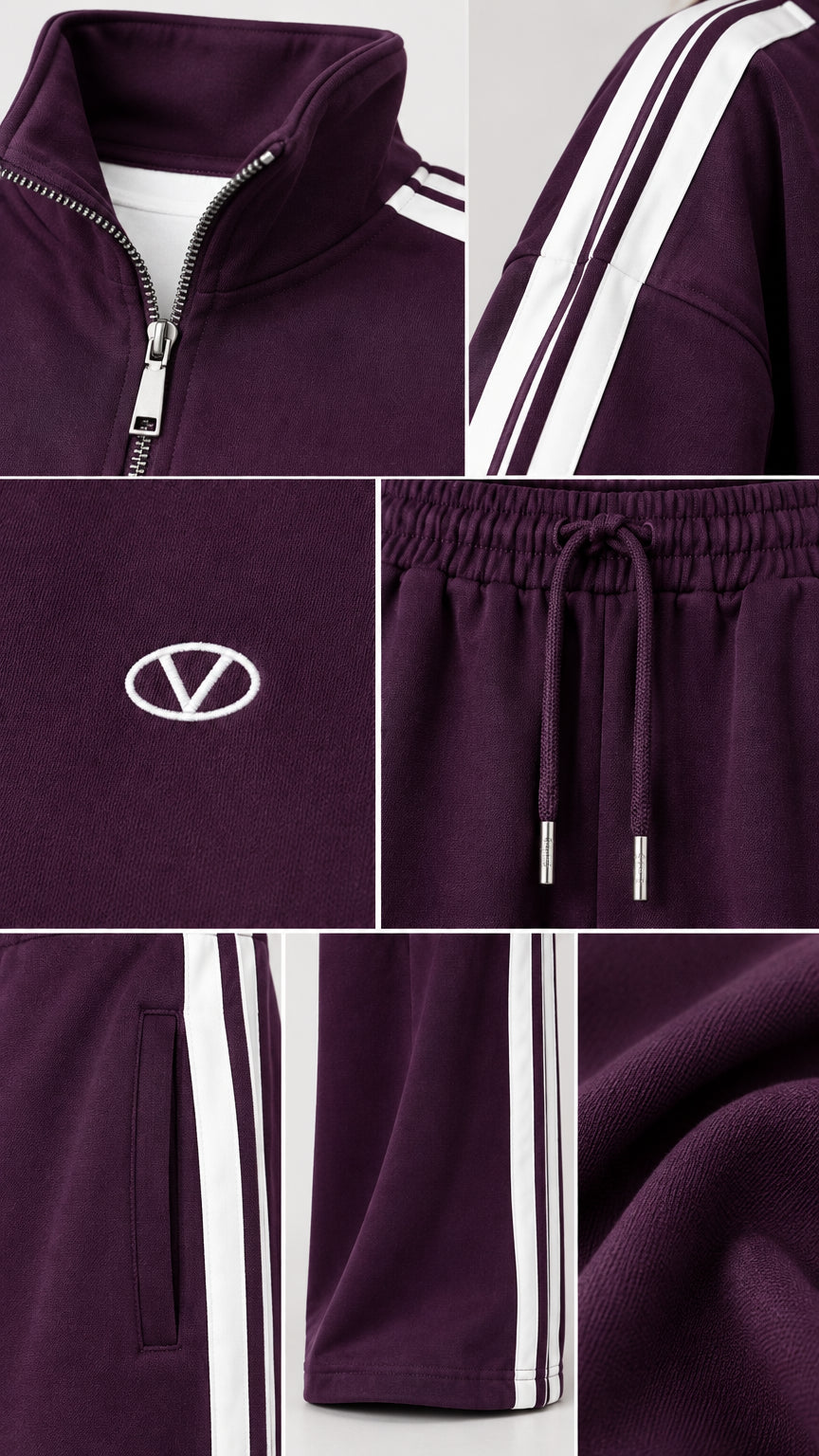 Close-up details of the quarter-zip collar, logo accent, drawstring waist, and side stripes