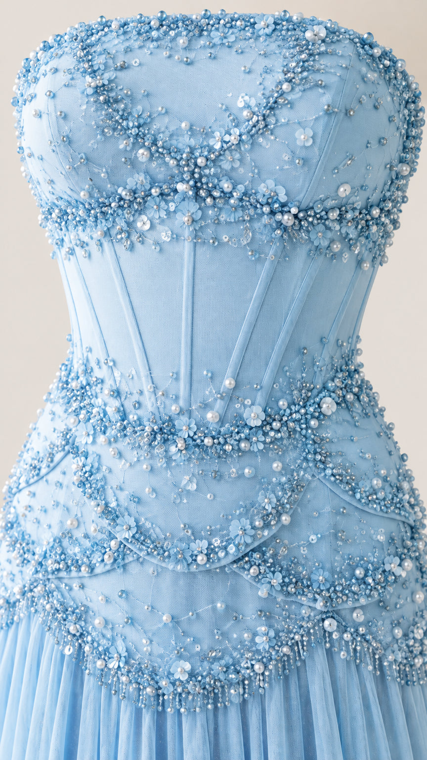 Close-up detail of sky blue corset bodice with pearl beadwork and structured boning