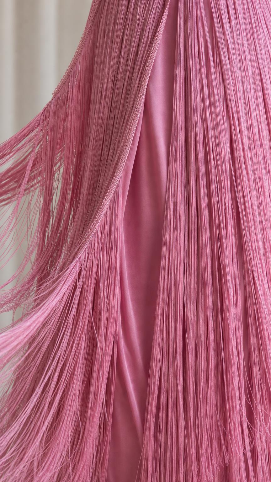Close-up detail of fine pink fringe texture
