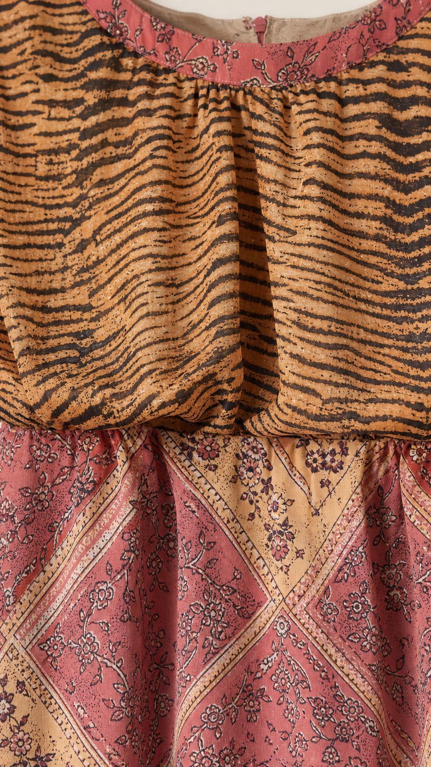Close-up detail of neckline and fabric pattern