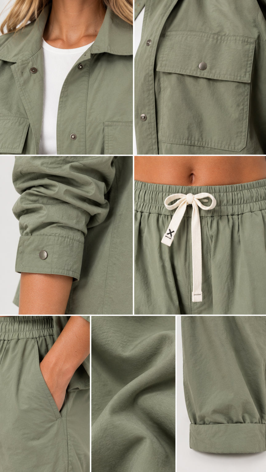 Detail view of collar, chest pockets, drawstring waist, and cuff details on utility set