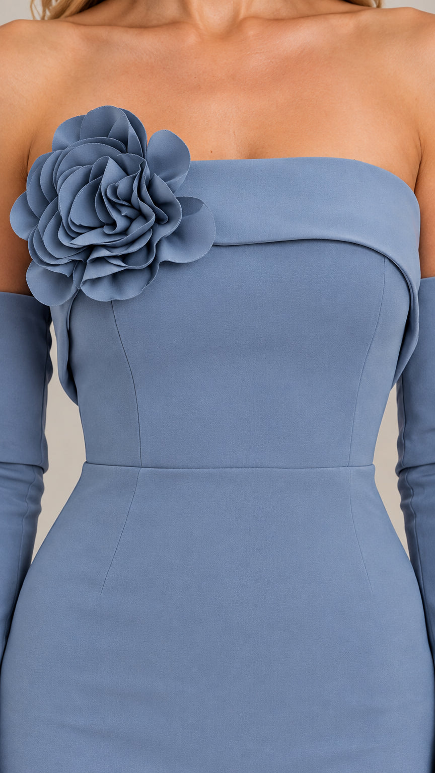 Close-up of 3D fabric flower corsage on dusty blue strapless neckline