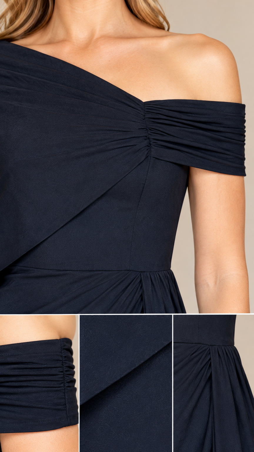 Close-up details of ruched off-shoulder sleeve and waist pleating on formal gown