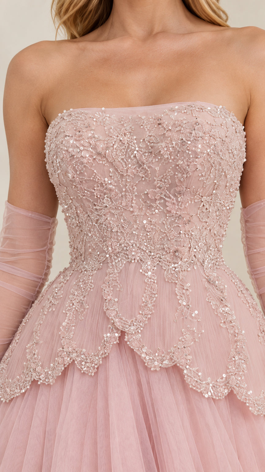 Close-up detail of Blush Pink beaded and embroidered bodice with scalloped waistline