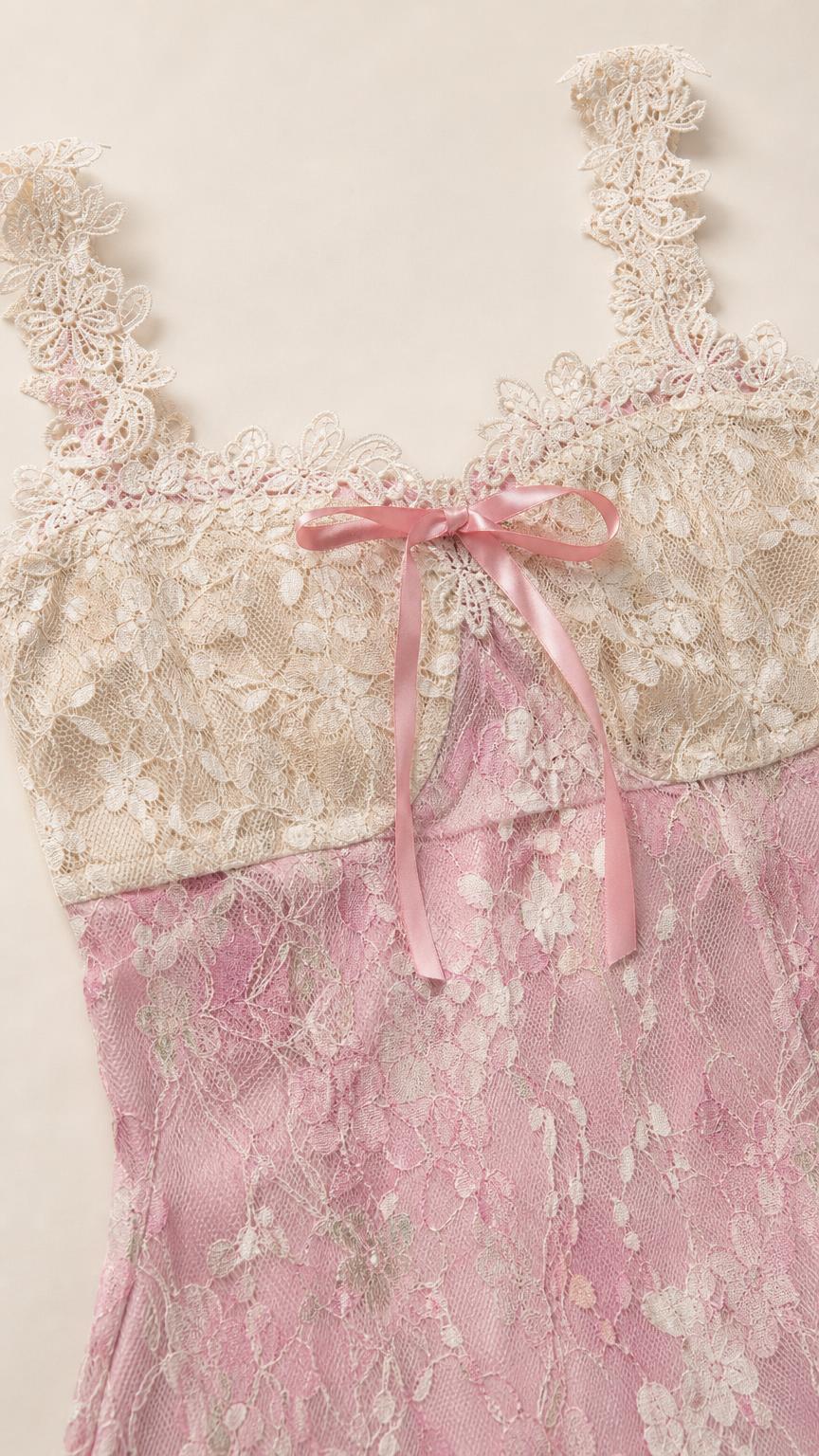 Close up of lace bodice and bow on pink dress