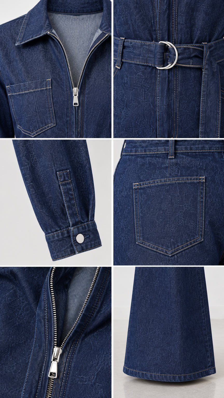 Close-up details of dark blue denim jumpsuit collar, zipper, belt, and cuff