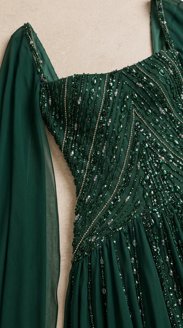 Close-up detail of green beaded and sequined structured dress bodice