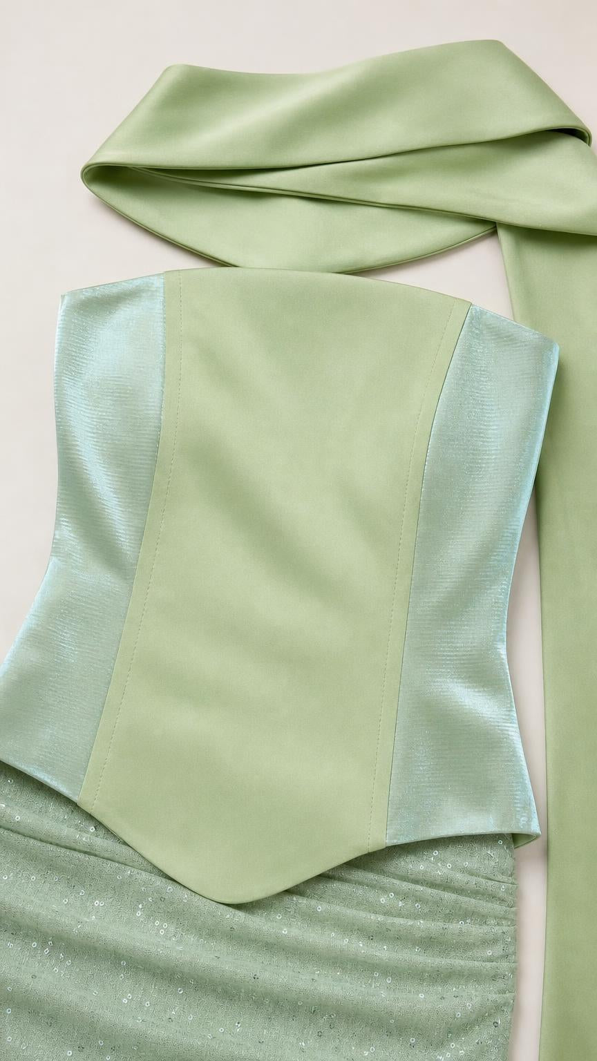 Close-up of sage satin bodice and matching scarf fabric