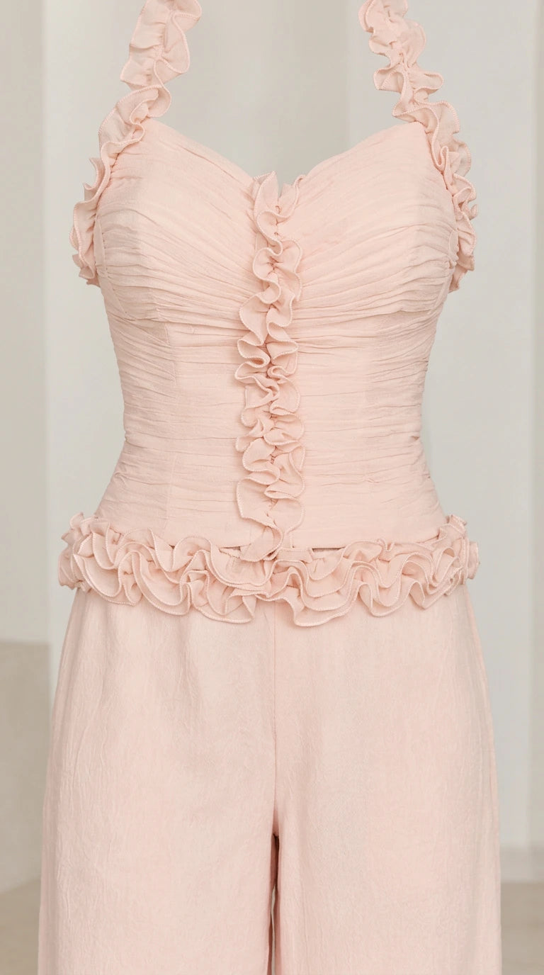 Close-up detail of Blush Pink ruched bodice with ruffle trims