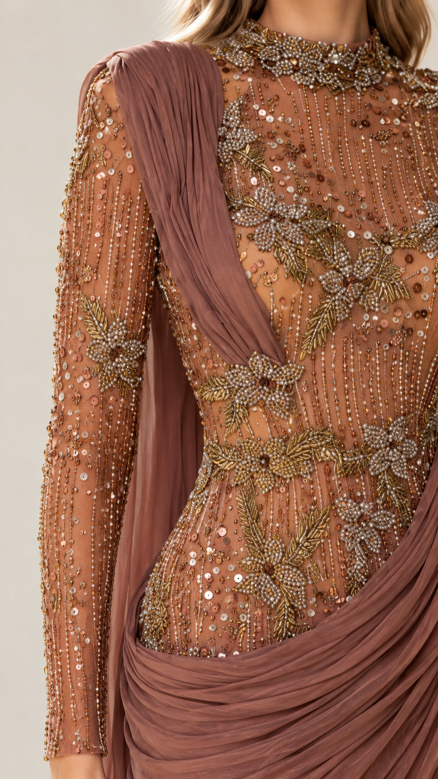 Close-up detail of sheer illusion neckline and intricate floral beadwork