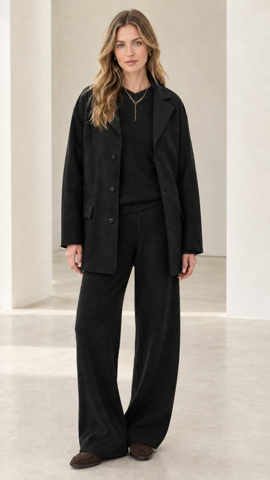 Full view of women's 3-piece knit lounge and jacket set in classic black