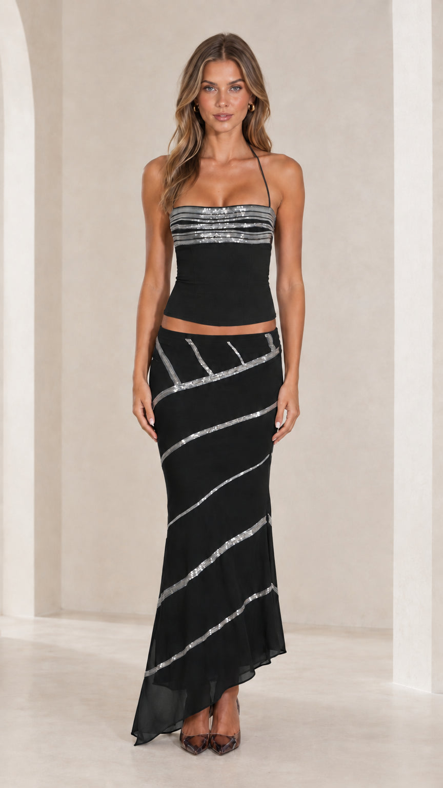Black sequin halter top and asymmetric maxi skirt two-piece set front view