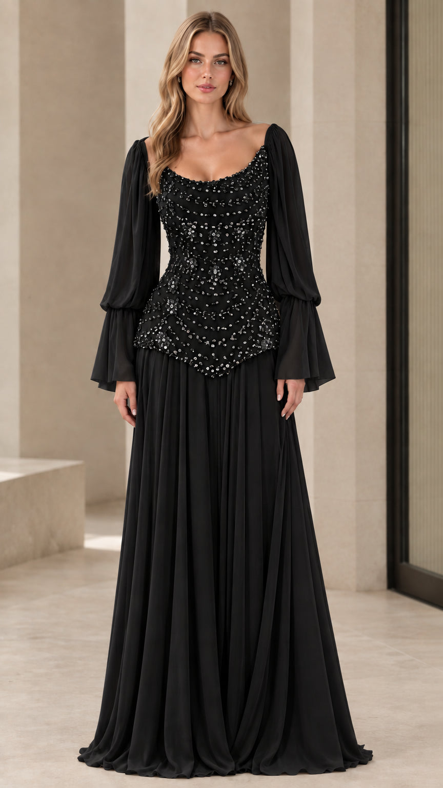 Front view of woman wearing black beaded bodice long sleeve formal evening gown