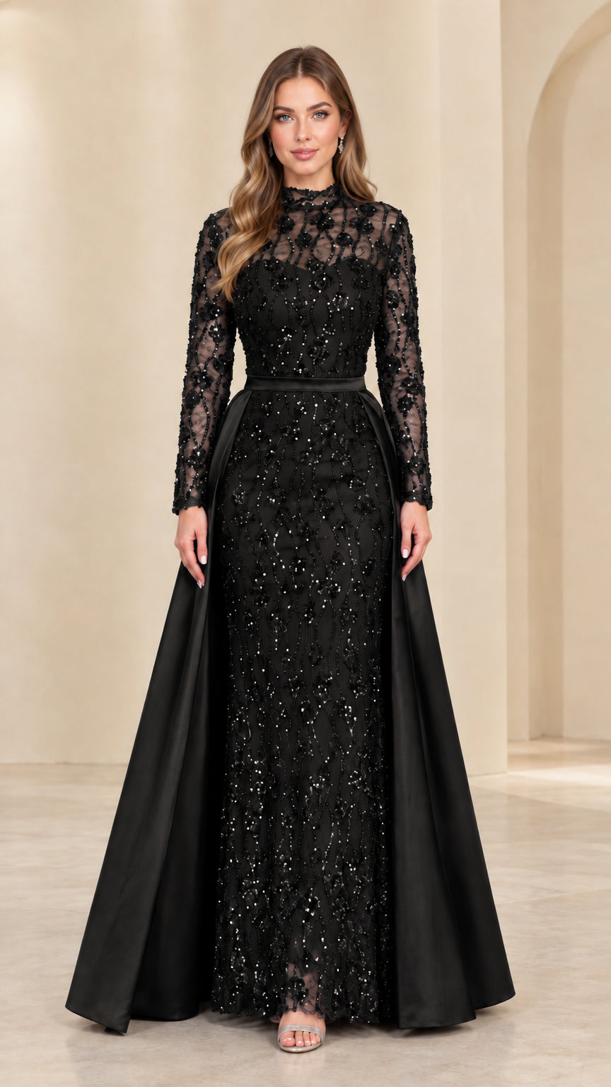 Front view of model in Black sequined lace high neck gown with satin overskirt