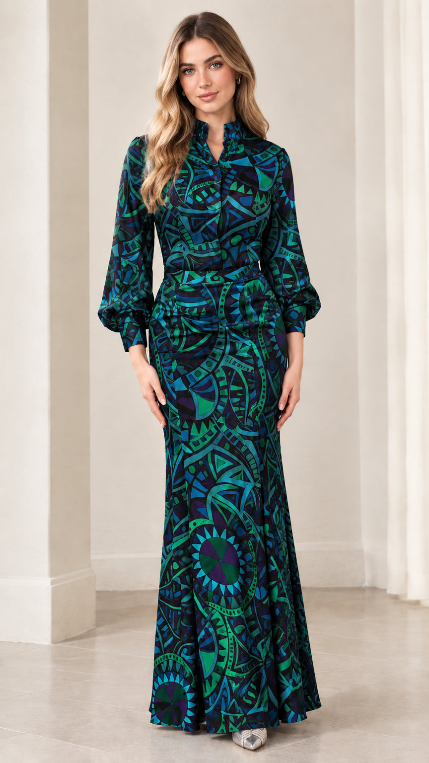 Model wearing dark teal geometric print long sleeve mermaid maxi dress