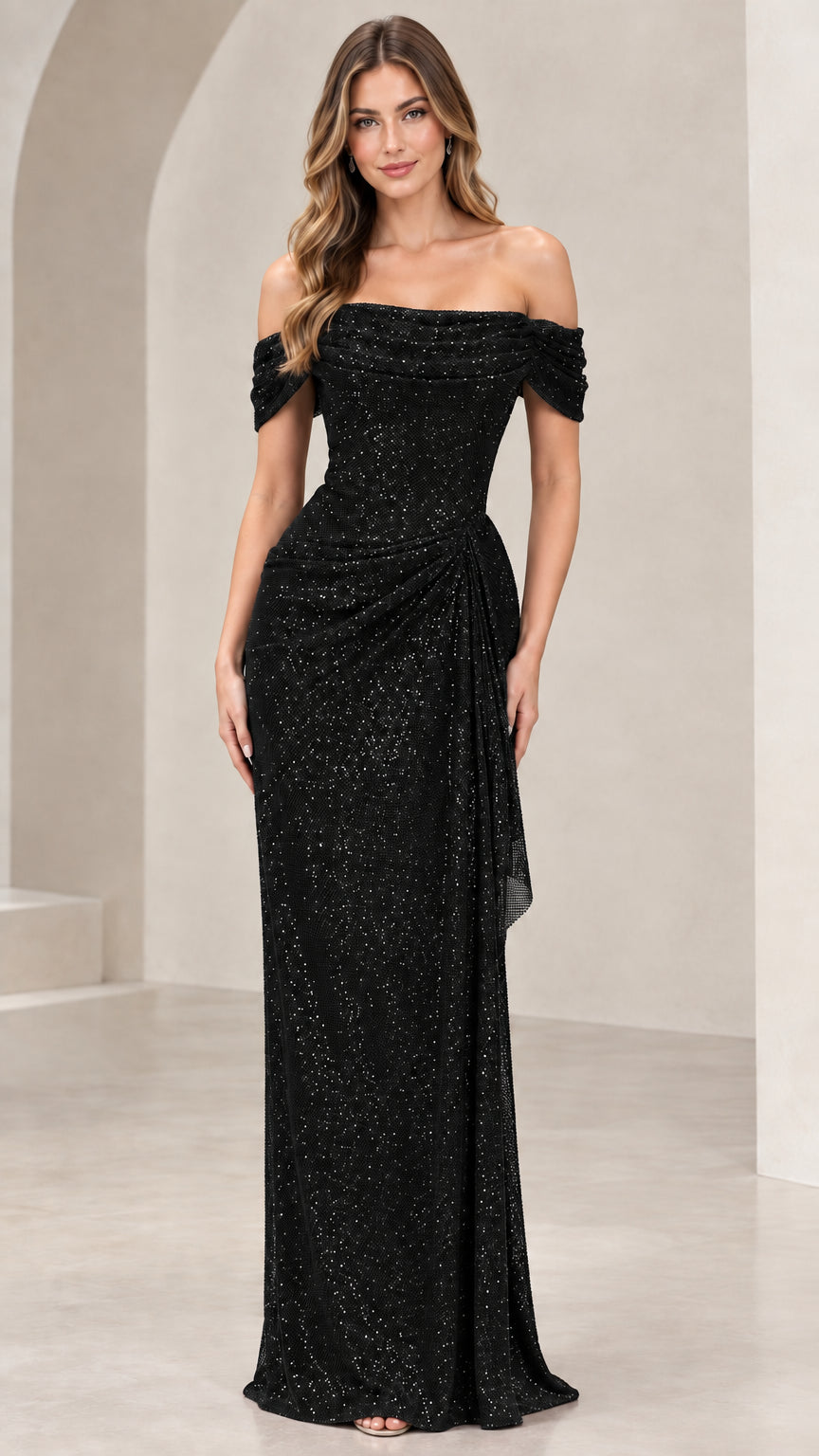 Front view of model wearing black off-the-shoulder shimmer maxi dress