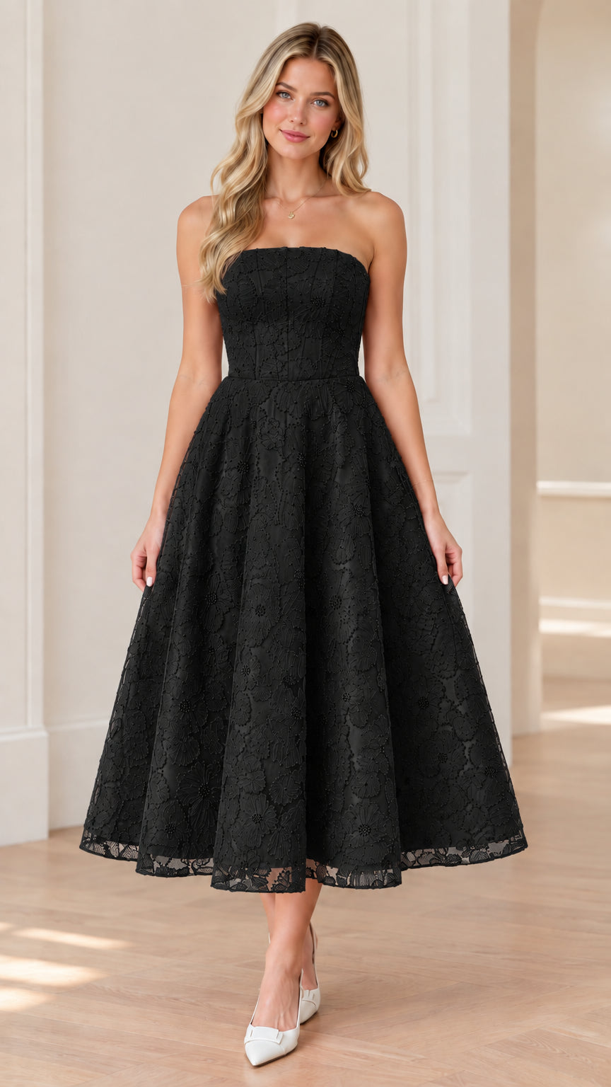 Front view of woman wearing strapless black floral lace midi dress