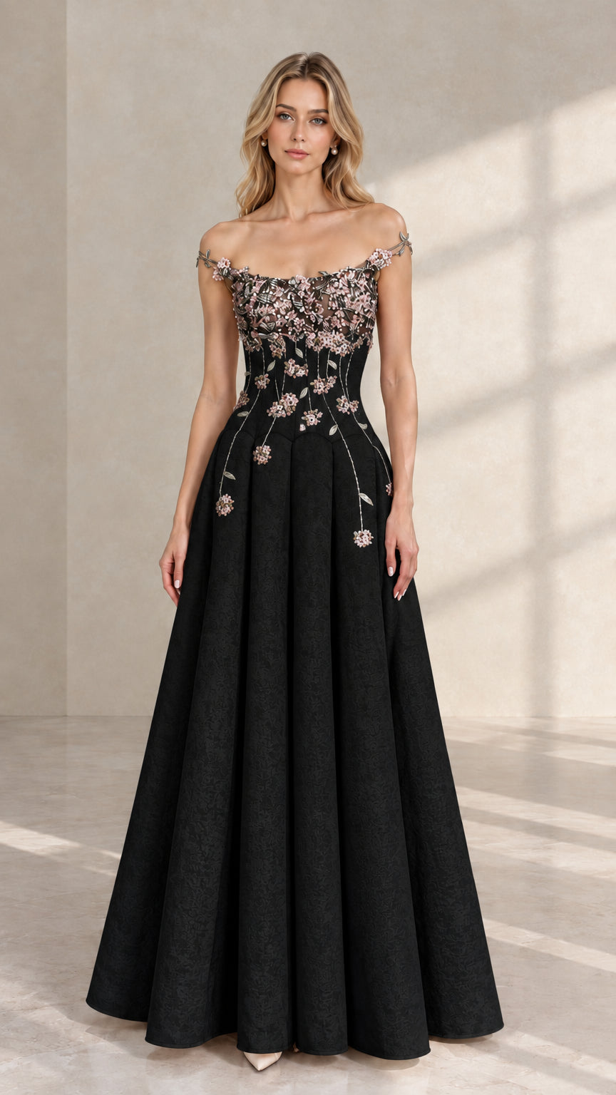 Front view of black off-the-shoulder A-line formal gown with floral embroidered bodice