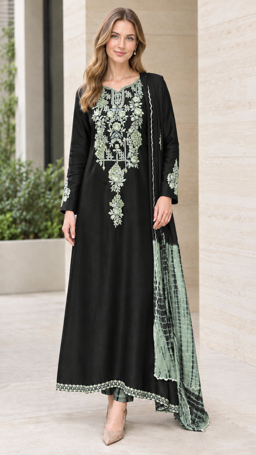 Front view of woman wearing Black floral embroidered kurta set with light green dupatta