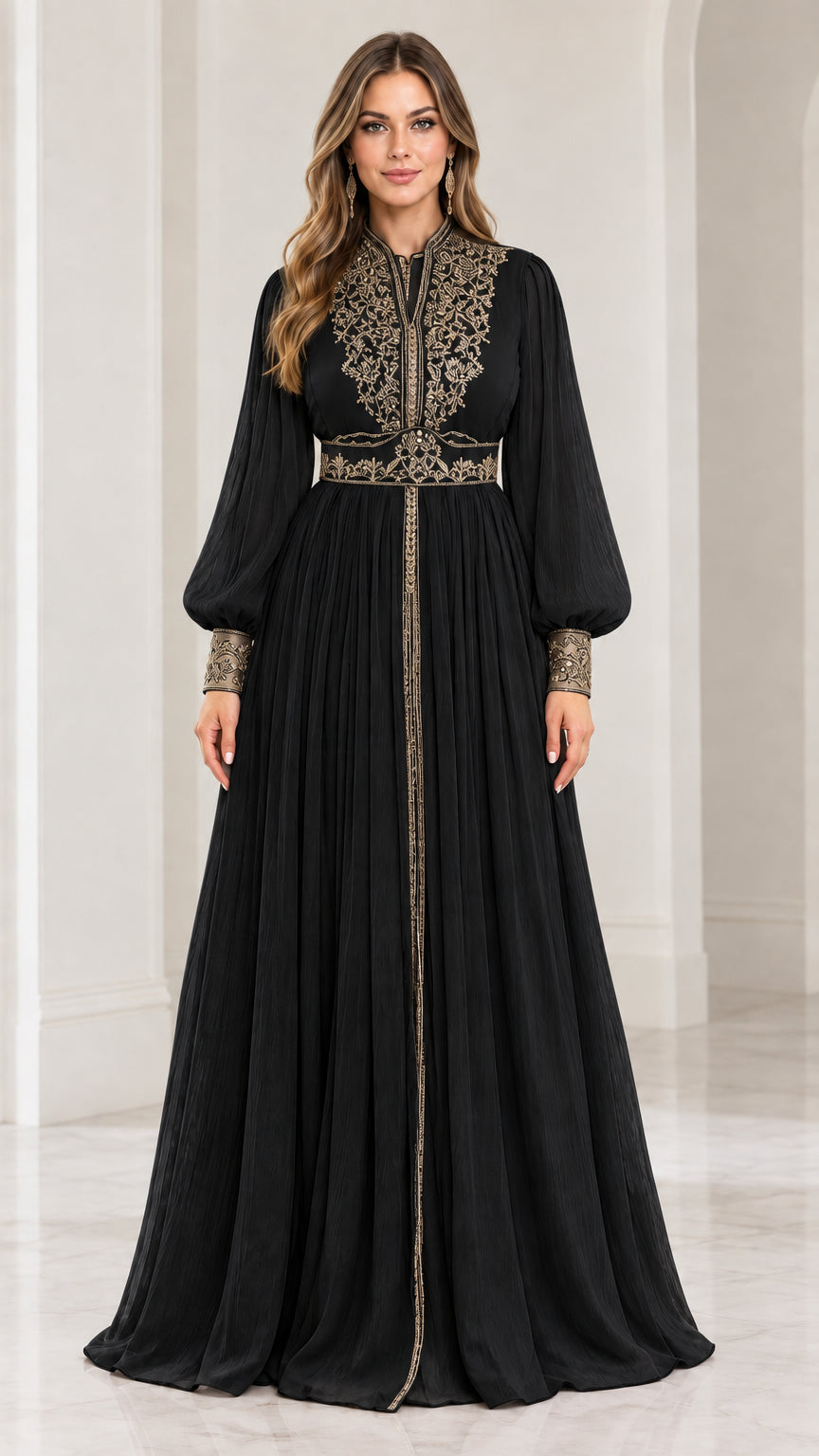 Front view of model wearing black embroidered long sleeve formal evening dress