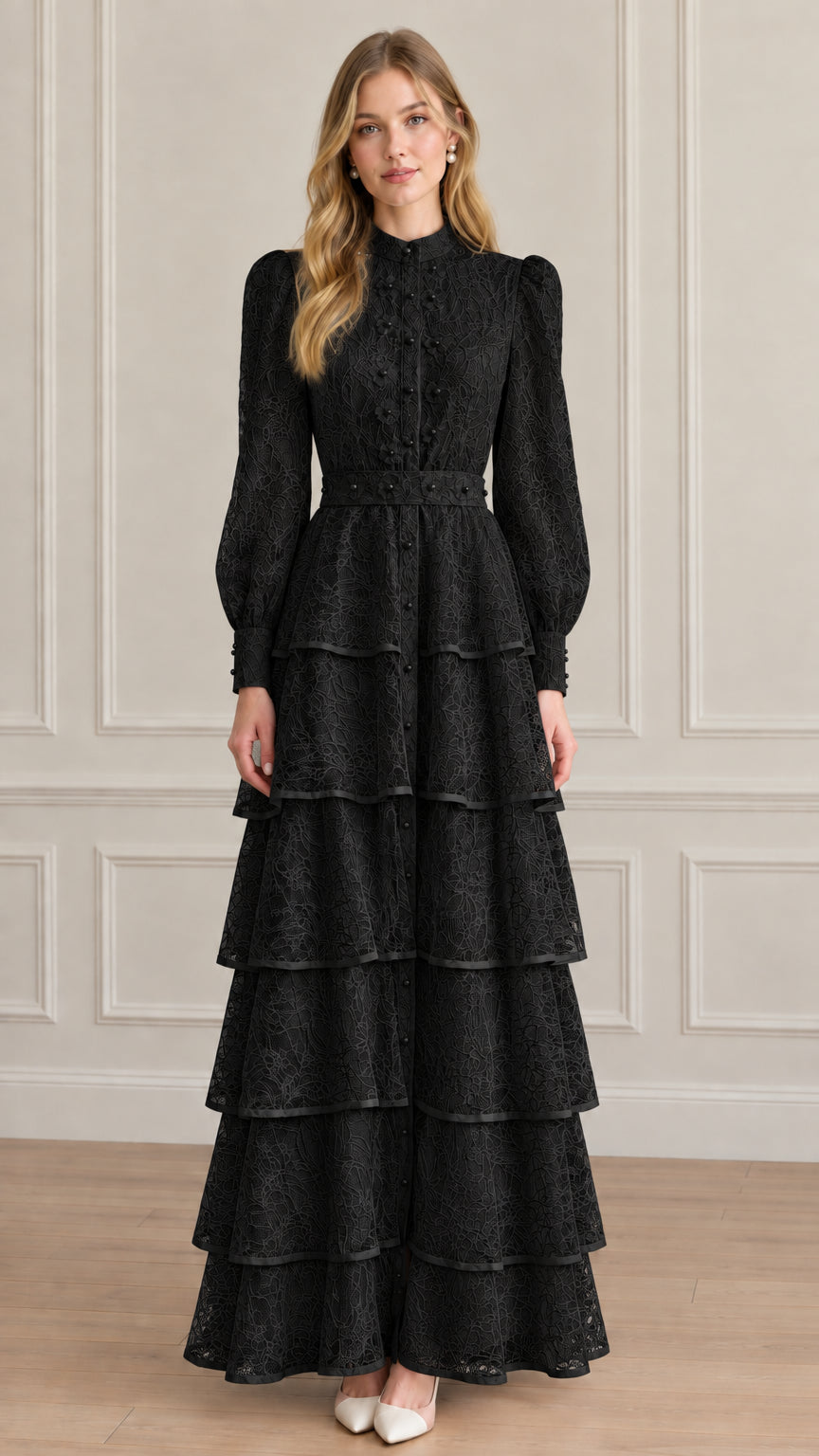 Model wearing black long sleeve high neck tiered lace maxi evening dress
