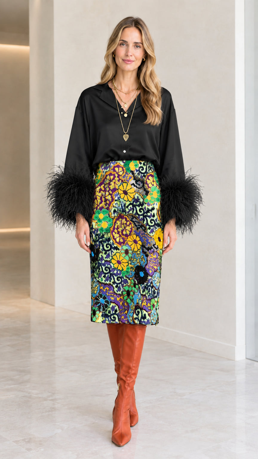Black satin blouse with matching black feather cuffs and floral midi skirt