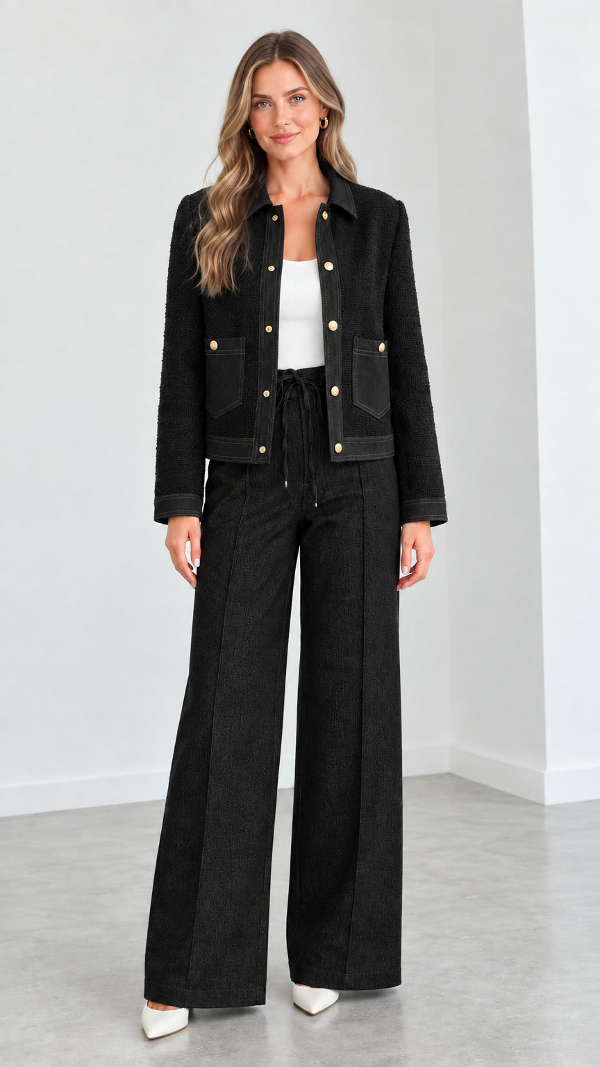 Women's black textured cropped jacket and matching wide leg pants set