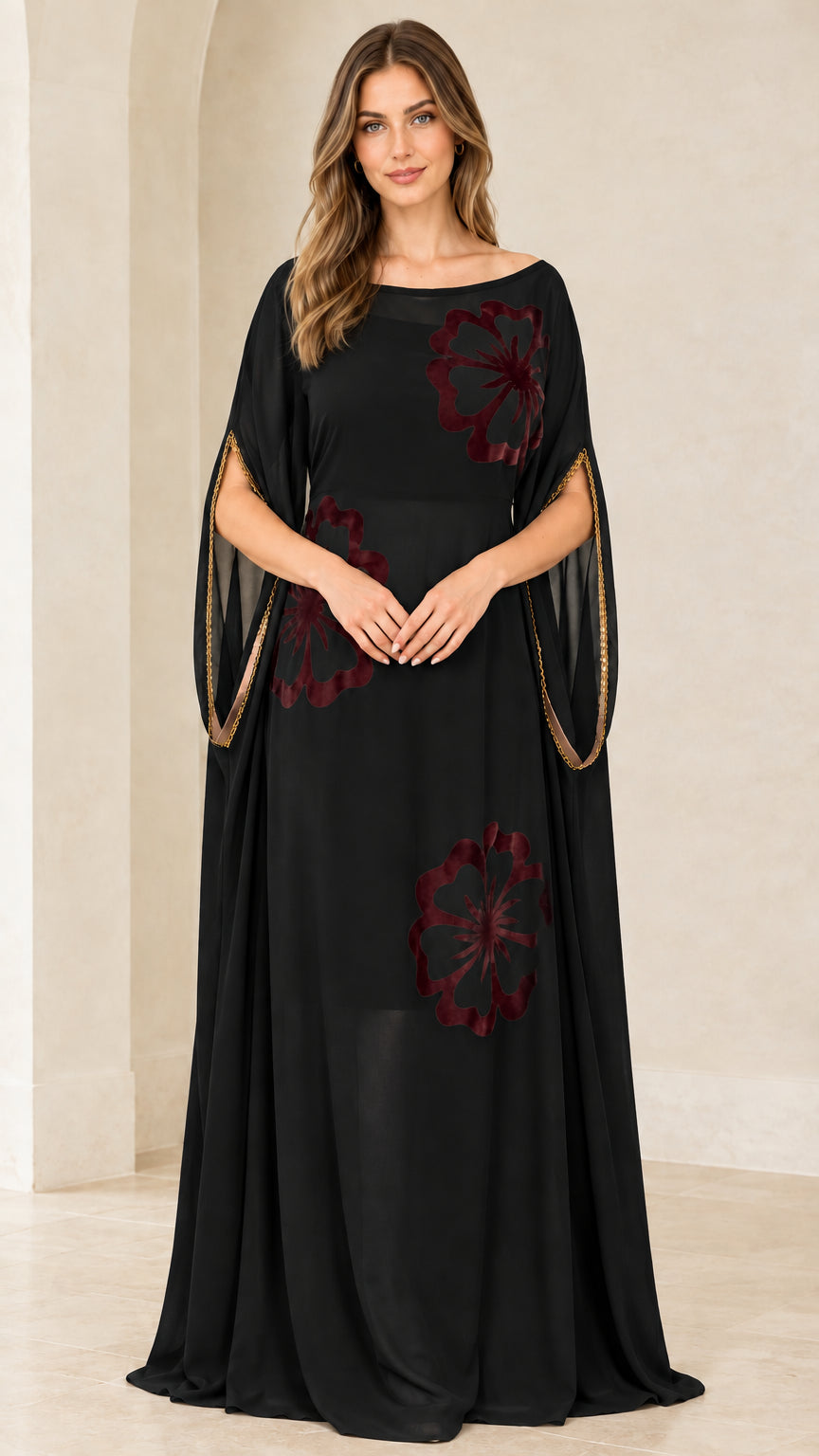 Front view of model wearing Classic Black floral applique kaftan maxi gown