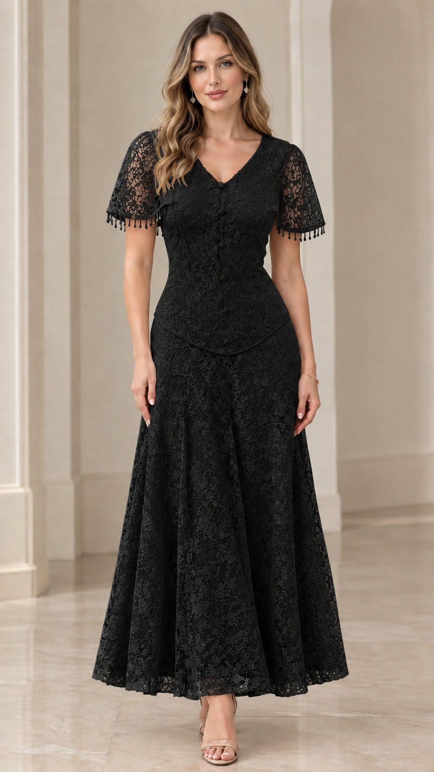 Front view of model in black floral lace V-neck maxi evening dress