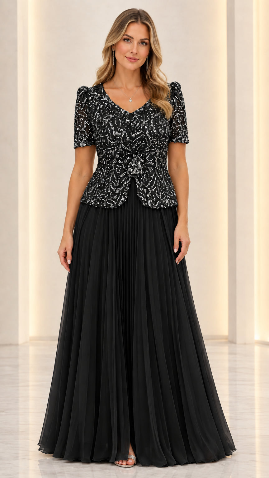 Full front view of black sequin peplum evening dress with pleated skirt