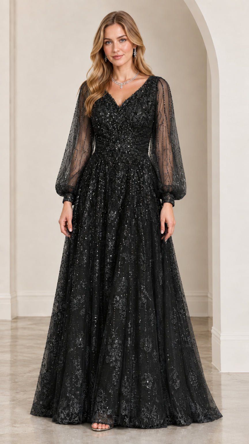 Model wearing Black beaded long sleeve A-line formal evening gown