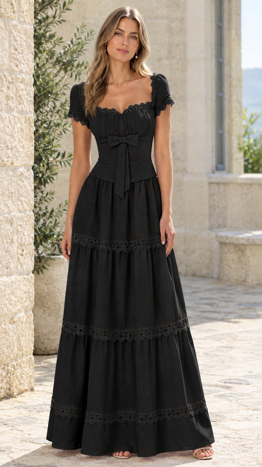 Full-length view of woman wearing black lace trim tiered maxi dress